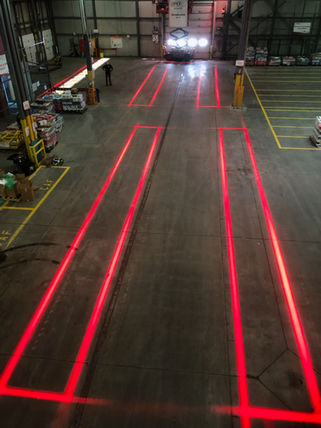 VirtuaLine red Projected Lines used to mark Exclusion Zones at a warehouse